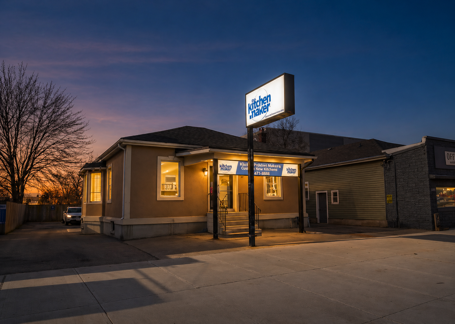 215 Wellington Street exterior at dusk with illuminated pylon signage