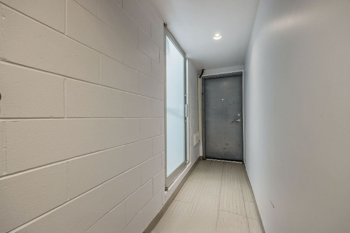 Service hallway connecting commercial and residential areas